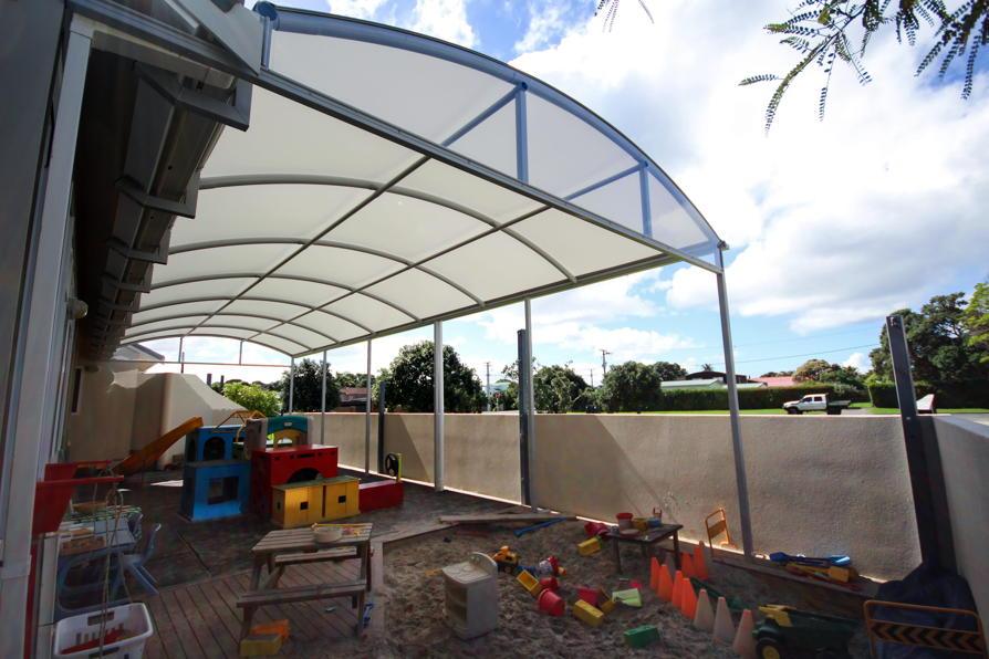 red-beach-kindy-canopy-fresco-shades-1 The children are happily playing outside even through storms and staff don’t have to keep moving the furniture as the weather changes. The head teacher commented that staff and children are cooler, less stressed and tired at the end of the day, which was an unexpected benefit. She is more than happy with the final result, and this job will lead to referrals.