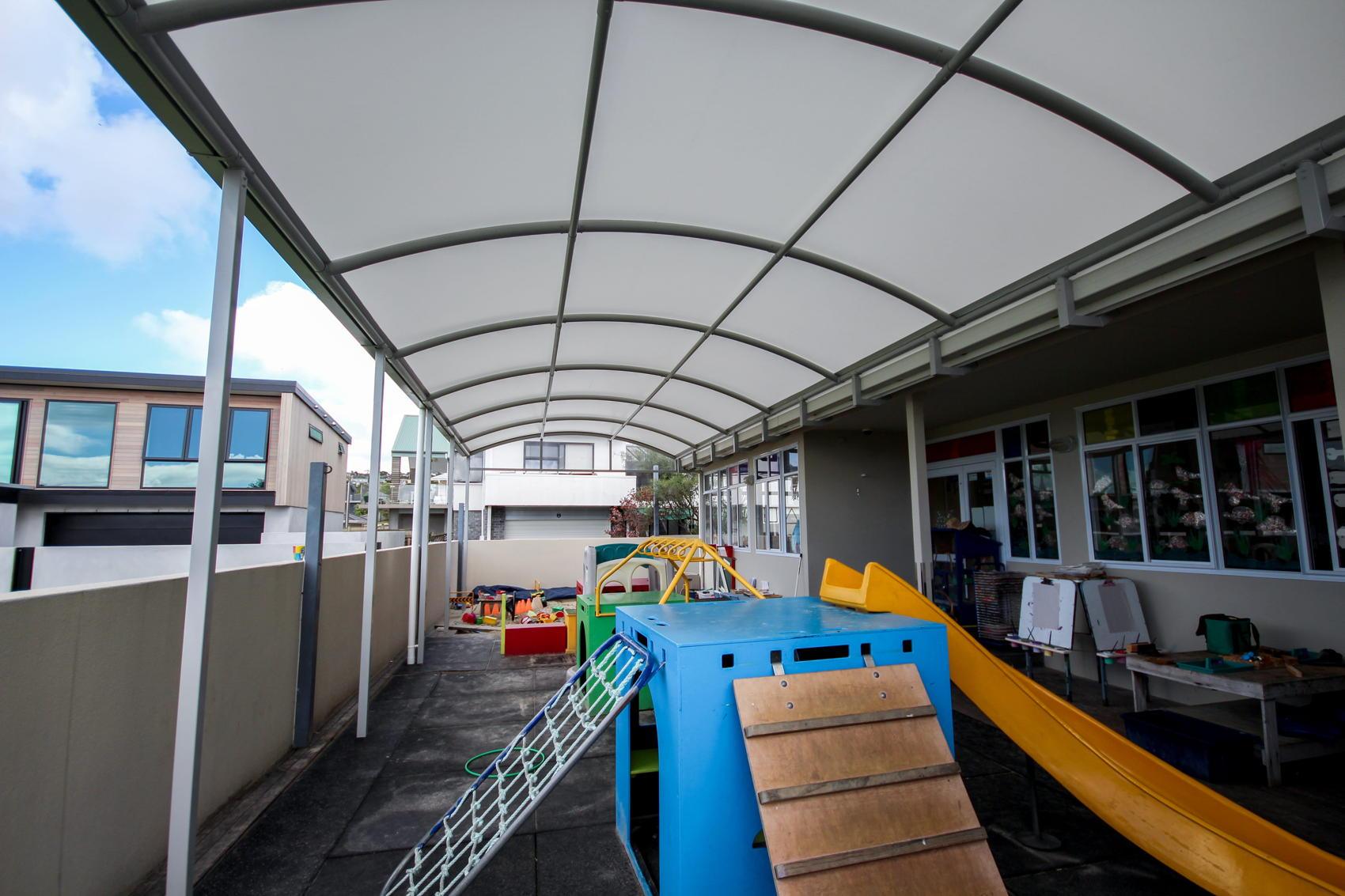 red-beach-kindy-canopy-fresco-shades Reach Beach Kindergarten playground canopy by Fresco Shades